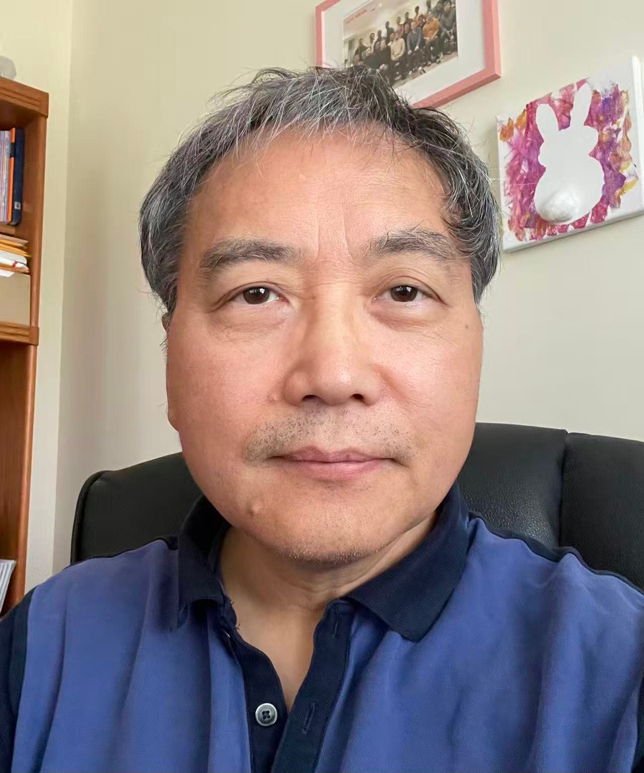 Elder Xuming Wang